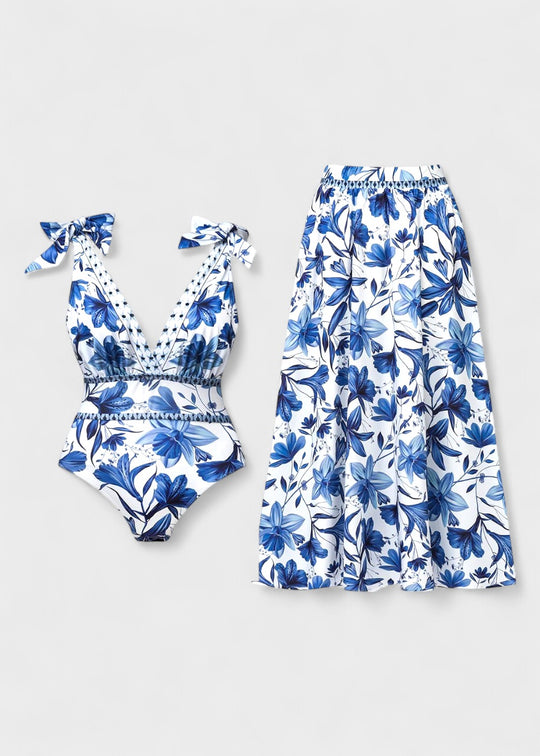 Bohemian blue floral swimsuit with V-neckline and skirt, laced up front