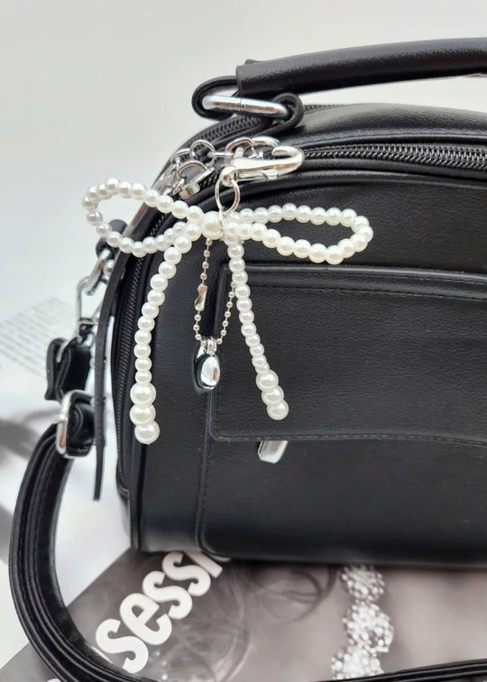 Pearl bow charm