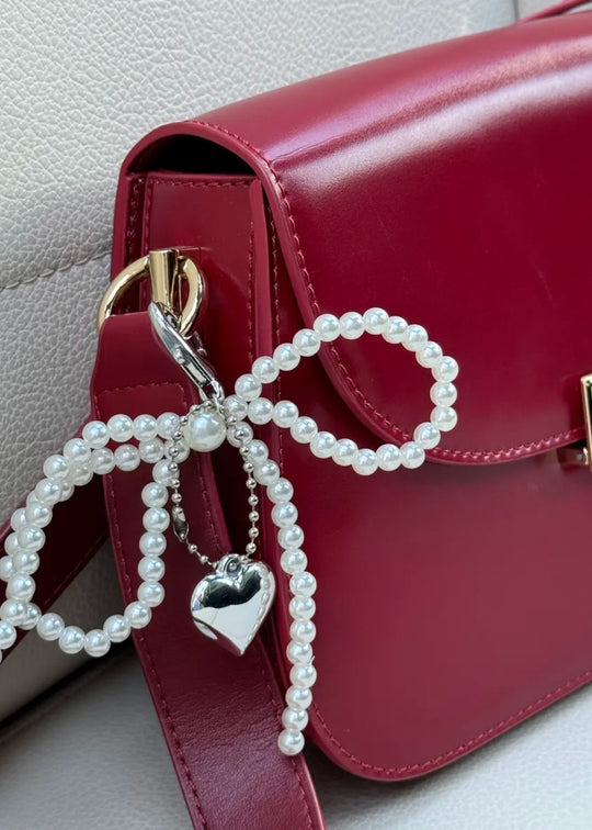 Pearl bow charm