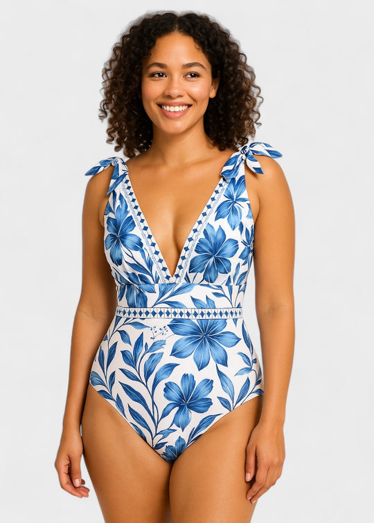 Bohemian blue floral swimsuit with V-neckline and skirt, laced up front