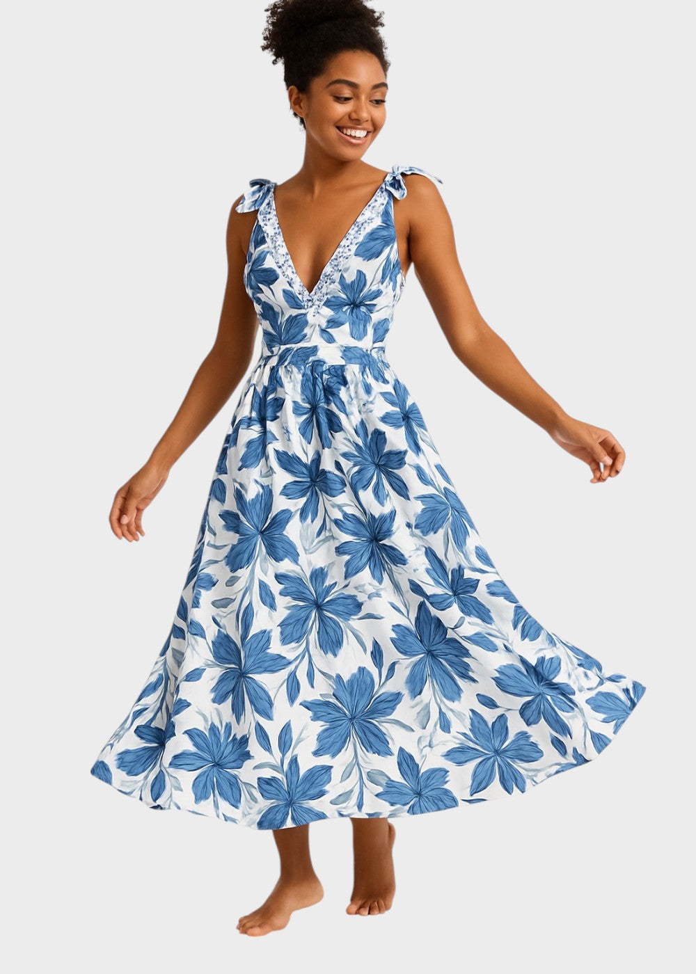 Bohemian blue floral swimsuit with V-neckline and skirt, laced up front